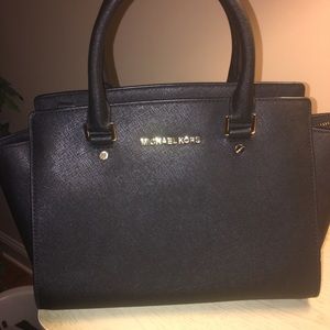 Michael Kors black pocketbook